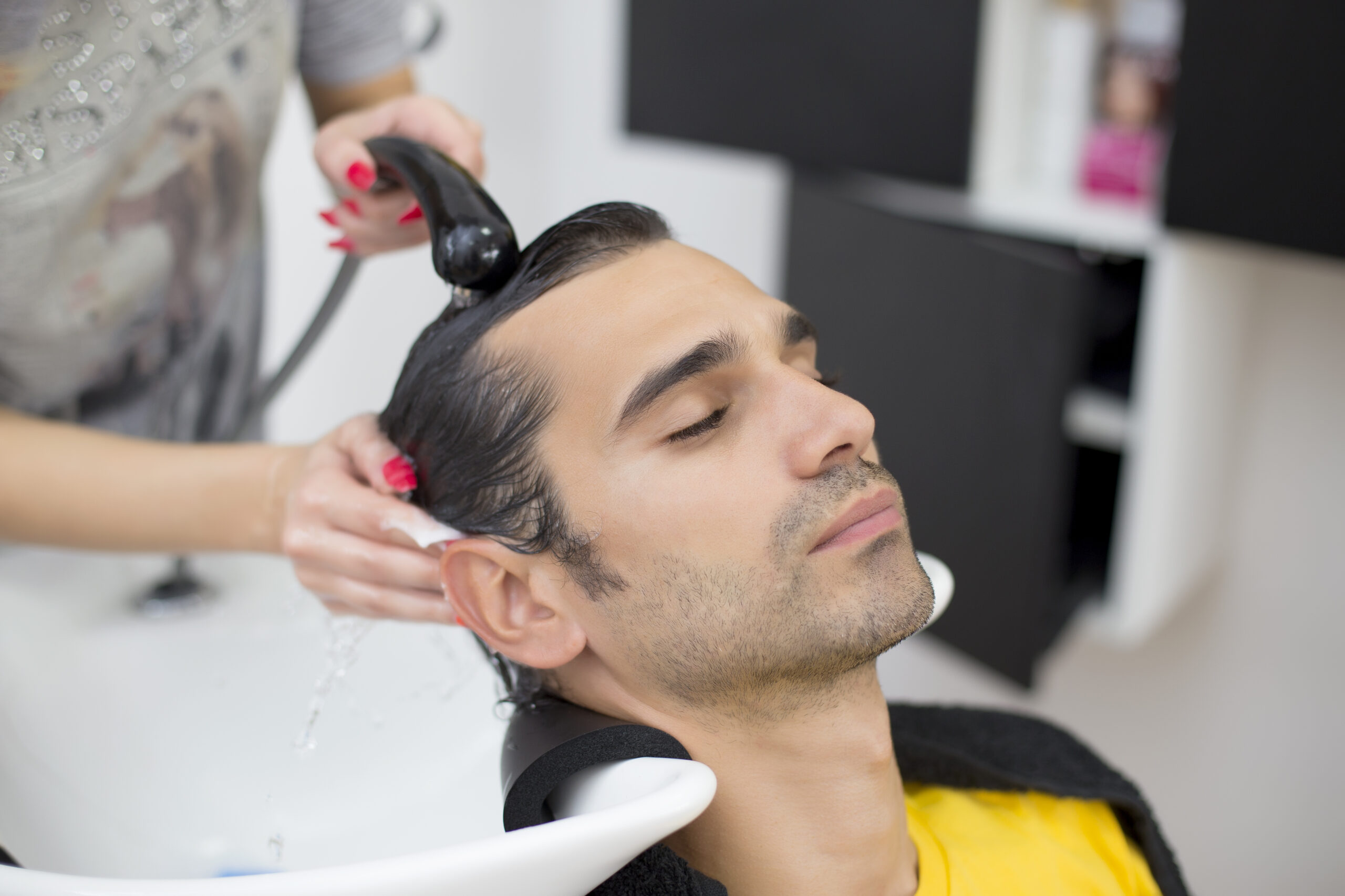Young man at hairdresser